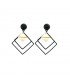 Tropfengeometrische Ohrringe in Schwarz und Gold
