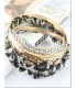 Léopard de bracelet orné de quatre cercles strass