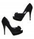 Chaussures embellies par arc noir de luxe suède